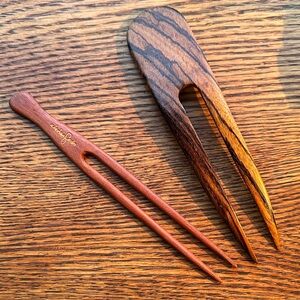 Bundle of 2, 2 pronged hair sticks carved out of wood. Made in Hawai’i. Boho